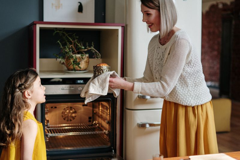 Oven Repair — residential oven being serviced